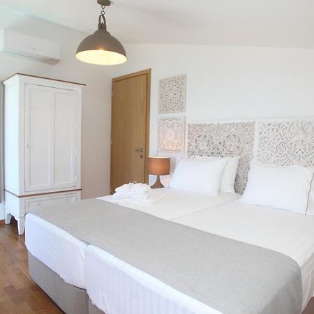 Capro - Milos Bay Villas Áyios Nikítas Esterno foto