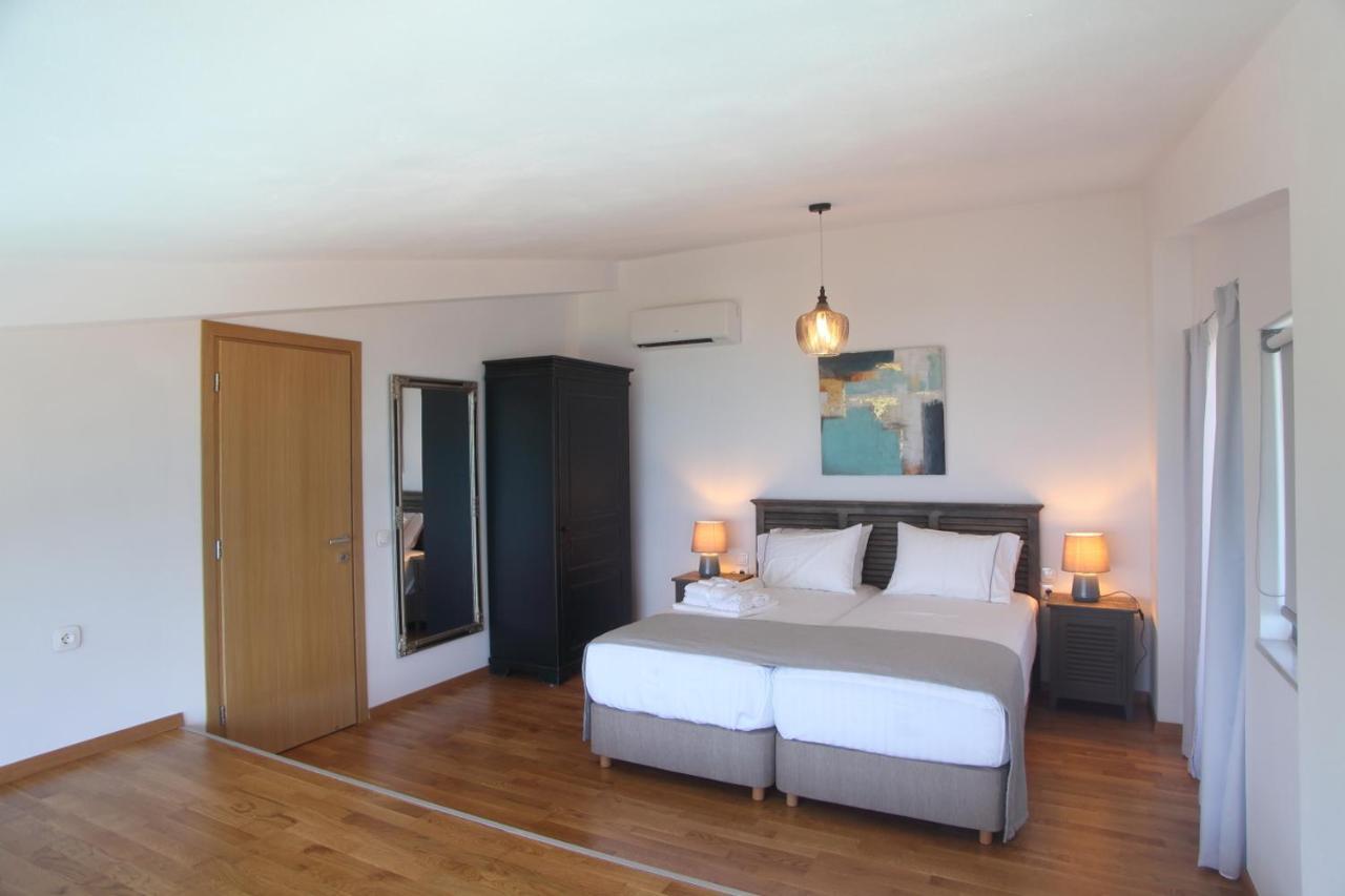Capro - Milos Bay Villas Áyios Nikítas Esterno foto