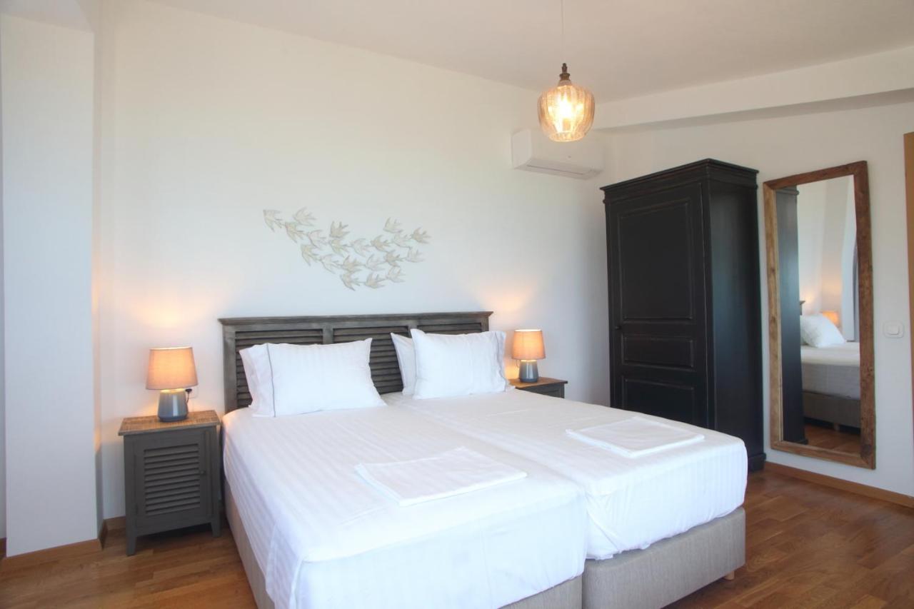 Capro - Milos Bay Villas Áyios Nikítas Esterno foto